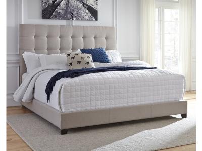 Signature Design by Ashley® Dolante Queen Upholstered Bed with Chest of Drawers and Nightstand - B130B7